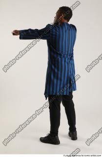 Garson STANDING POSE WITH GUNS 